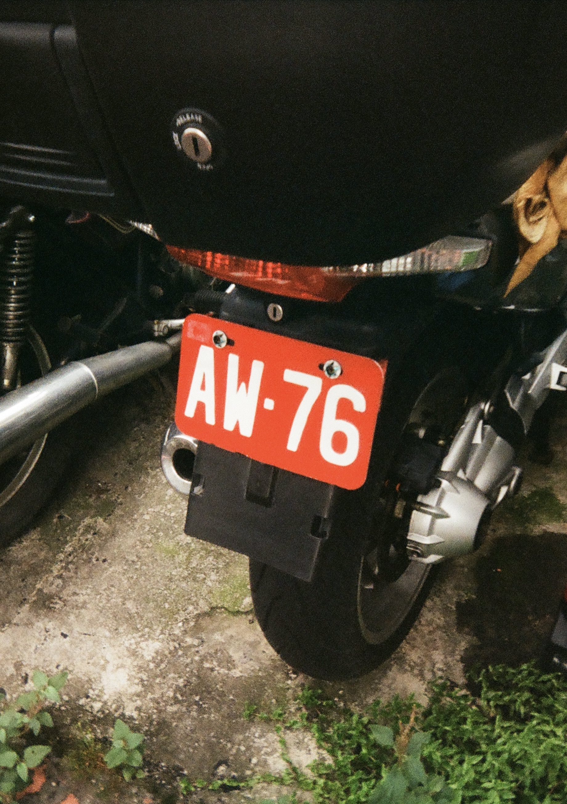 Scooter plate reading AW-76